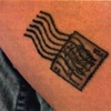 tattoo of a postmarked stamp