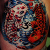 two koi fish tattoo