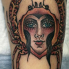 CRAB WOMAN FACE TATTOO
