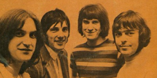Image of the band, Kinks, a black and white photo with an orange overlay. 